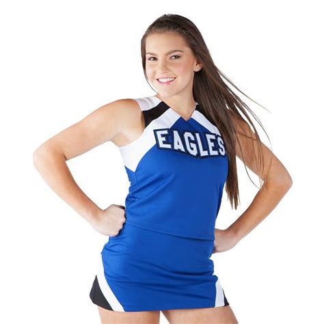 A Woman In A Cheer Uniform Posing For The Camera