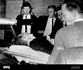 Dying assassin Lee Harvey Oswald is placed in ambulance after he was ...
