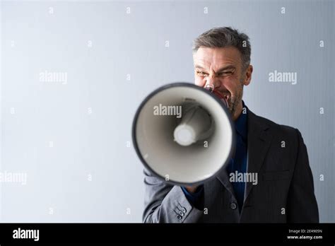 Man Making Megaphone Announcement Warning Concept Speaker Stock Photo