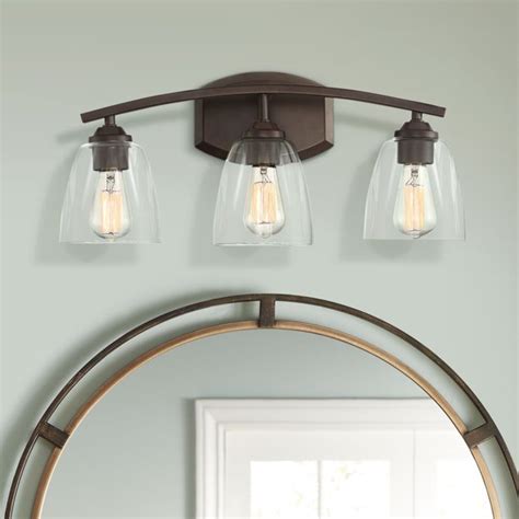 You'll light both your bathroom and see yourself better as you get ready to tackle the day. 360 Lighting Farmhouse Wall Light Bronze Hardwired 22 ...