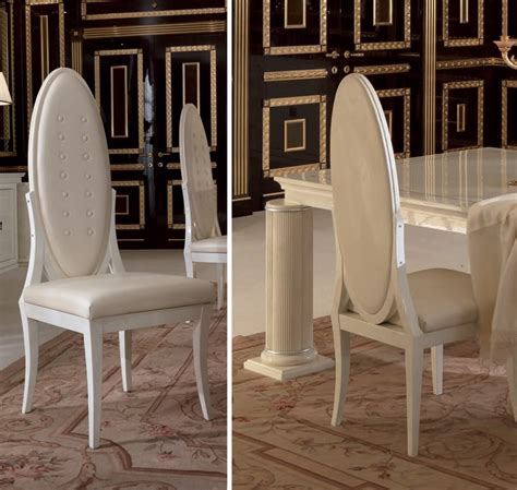 A Chair With Oval Backrest And Upholstered Roma Turri Luxury Furniture Mr
