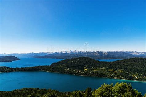 Landscape Of Blue Lakes Andes Mountains And Forest In Patagonia