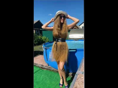 Watch Girl Wears Her Long Hair As A Dress In Viral Video Times Of India