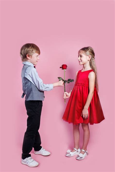 424 Little Boy Girl Red Rose Stock Photos Free And Royalty Free Stock