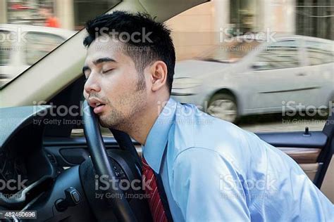 Tired Young Man Sleeping Inside The Car Stock Photo Download Image