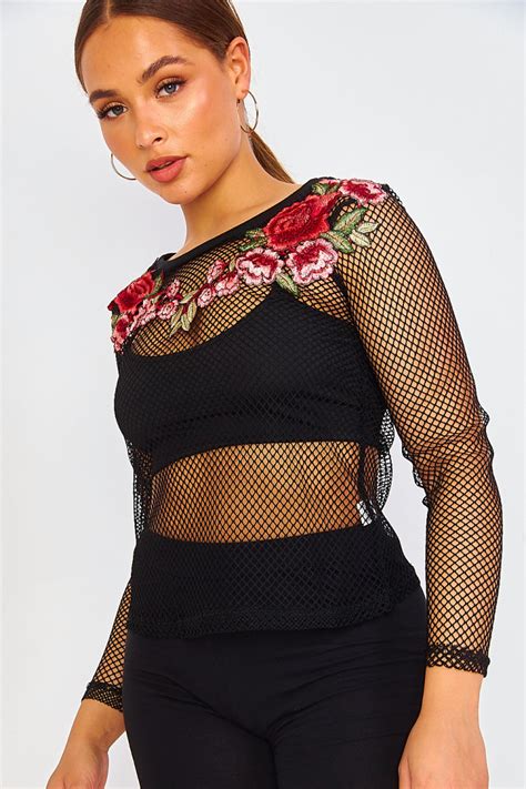 Un choix unique de top transparent noir disponible dans notre magasin. Top transparent en maille noir