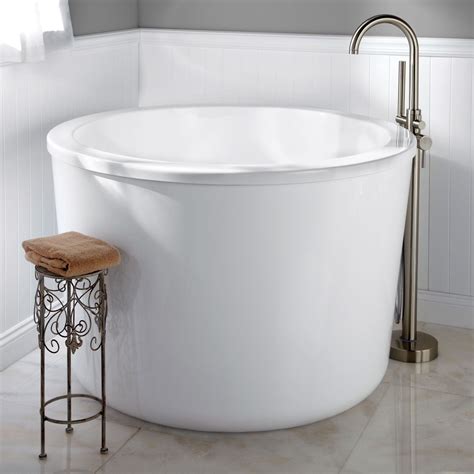 Japanese bathtubs offer a unique bathing experience in therapeutic hot water. 47" Caruso Acrylic Japanese Soaking Tub http://www ...