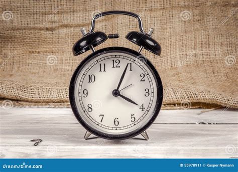 Classic Alarm Clock On A Wooden Table Stock Image Image Of Number