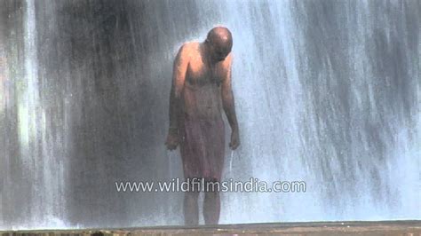 Man Bathing In Thiruparappu Waterfalls India Youtube