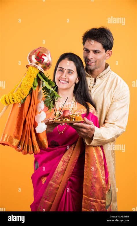 Smart Indian Couple In Traditional Wear Performing Gudhi Padwa Puja