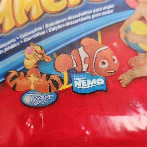 4 Huggies Little Swimmers Disposable Swim Pants 10 Count 32lbs Tigger