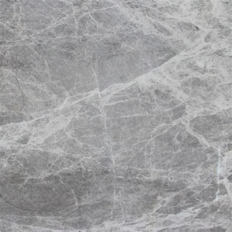 A White Marble Textured Surface With Grey Veining