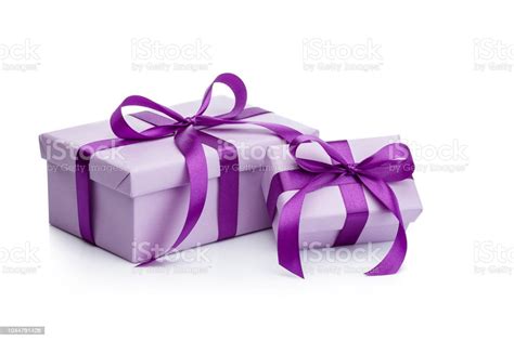 Two Purple T Boxes With Purple Ribbons Isolated On White Background