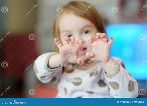 adorable girl showing something with her fingers stock image image of caucasian emotion 19380821