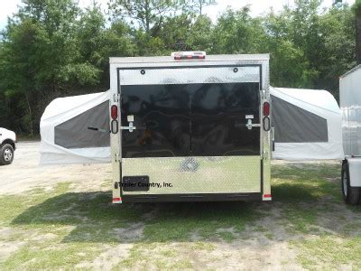 With a 26.6 feet size, this travel trailer allows you to sleep your little ones on the sofa or. 7x16 7 x 16 SPORT ENCLOSED CARGO TRAILER W/ POP-OUT BED