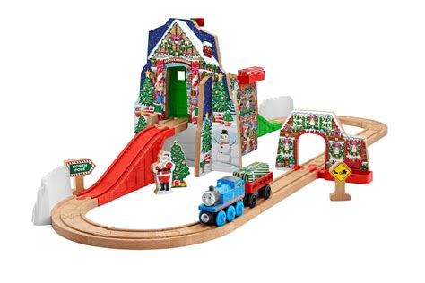 He is also pulling a truck filled with candy canes, a tanker of hot. Fisher-Price Thomas the Train Wooden Railway Santa's ...