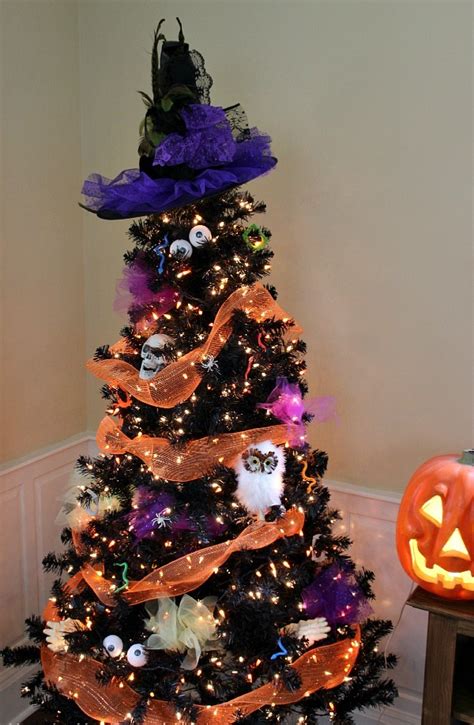 Looking for ways to upcycle your old wine bottles and mason jars? 24 Indoor & Outdoor Tree Halloween Decorations Ideas