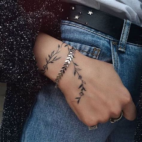 Wrist tattoo placement meaning and ideas: Meaningful Wrist Bracelet Floral Tattoo Designs For You ...