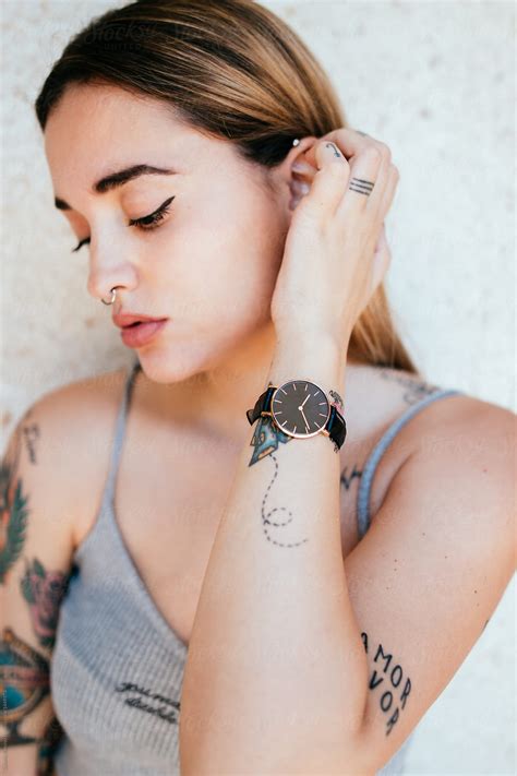 Portrait Of Woman With Wrist Watch By Stocksy Contributor Susana