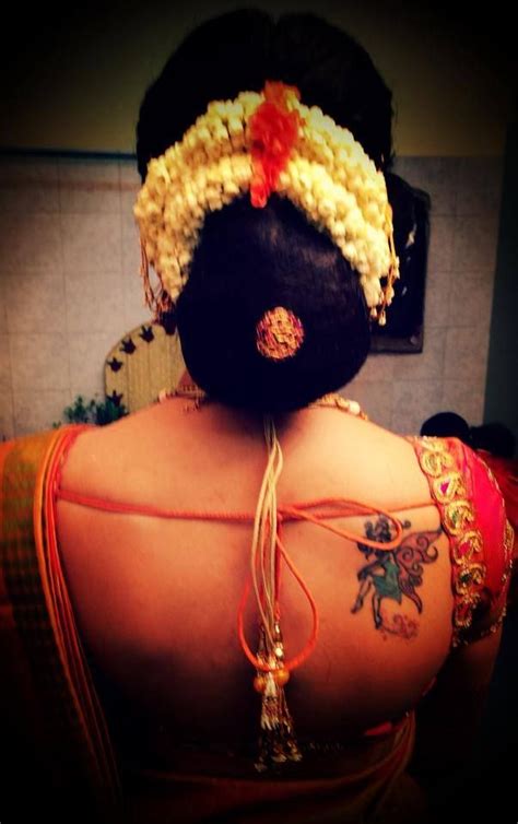 Traditional South Indian Brides Bridal Hair Bun Hairstyle By Swank