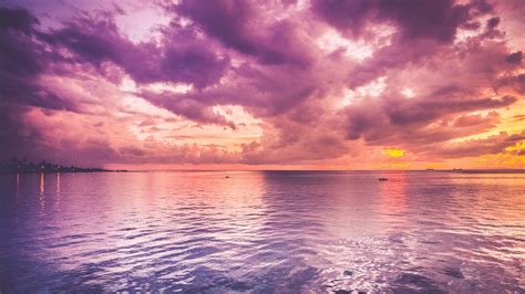 Purple Cloudy Sky Above Body Of Water During Sunset 4k Hd