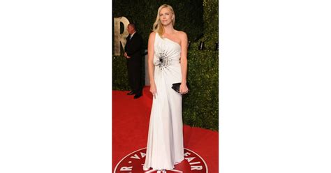 Charlize Theron In Versace At The Vanity Fair Oscars Party Celebrities Wearing Versace