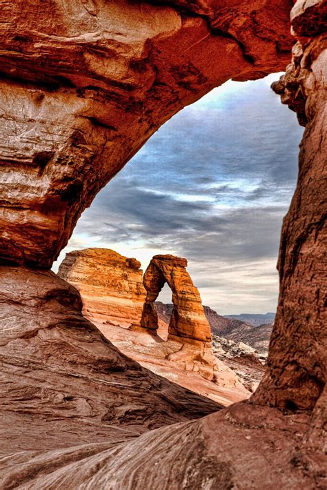 Grainy Photograph Of A Rocky Arch In Arches National Park American