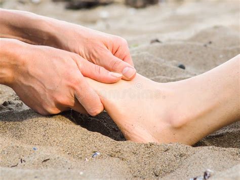 foot massage in sand male and female caucasian stock image image of coast couple 93126777