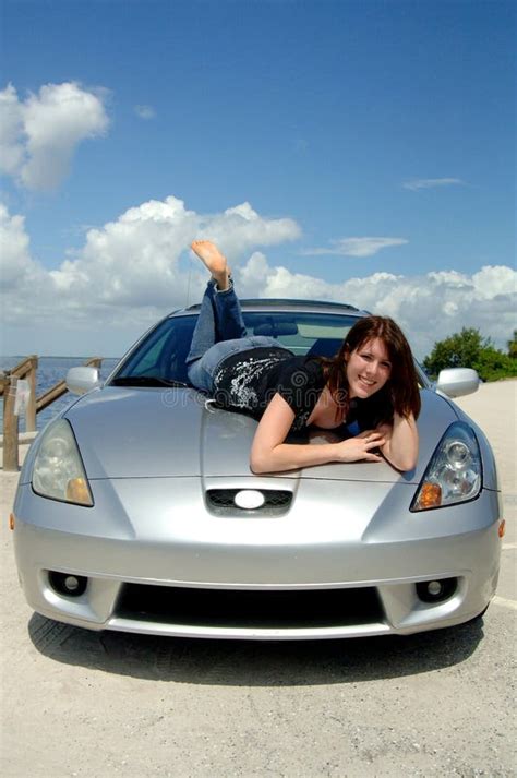 Teen Sitting On Car Hood On Cell Phone Stock Photo Image Of