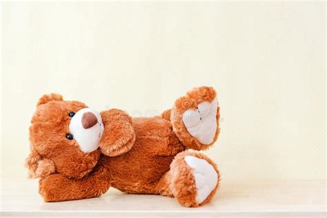 Resting Teddy Bear Soft Toy Lies On Its Side In The Children`s Room And