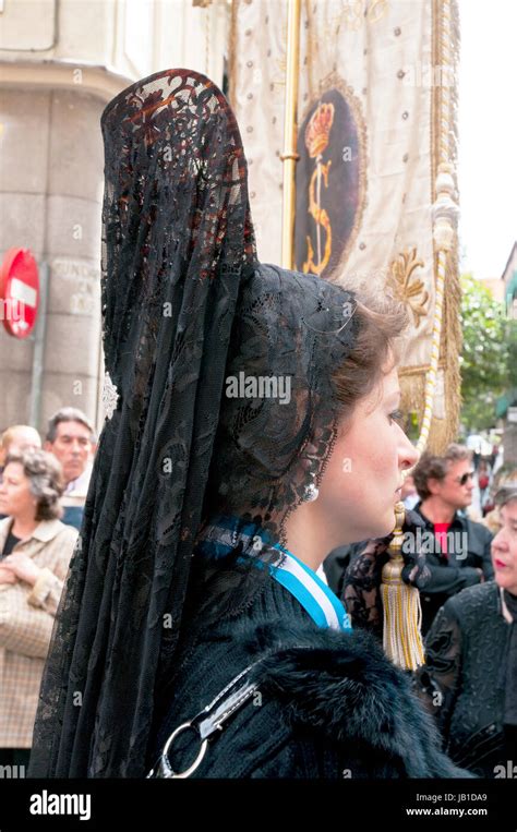 Woman Wearing Traditional Spanish Mantilla In A Holy Week Procession