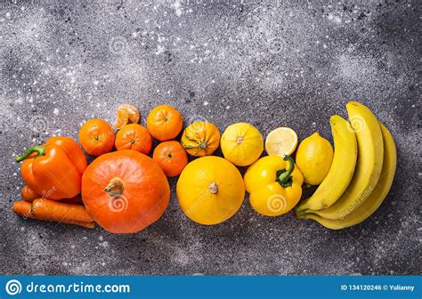 Assortment Of Yellow And Orange Fruits And Vegetables Stock Photo