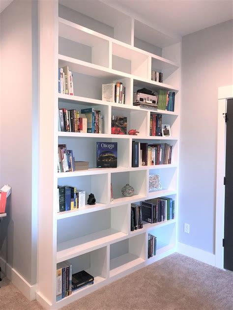We Built These Floor To Ceiling Shelves For A Small Wall In A Home
