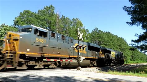 Manifest Freight Train Passes Railroad Crossing Youtube