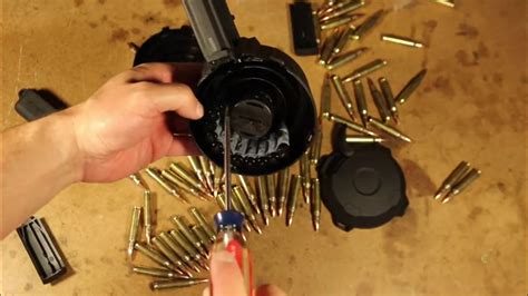 Let's face it, drawers get stuck. How To Unjam A Magpul D60 Drum Mag. -The Firearm Blog