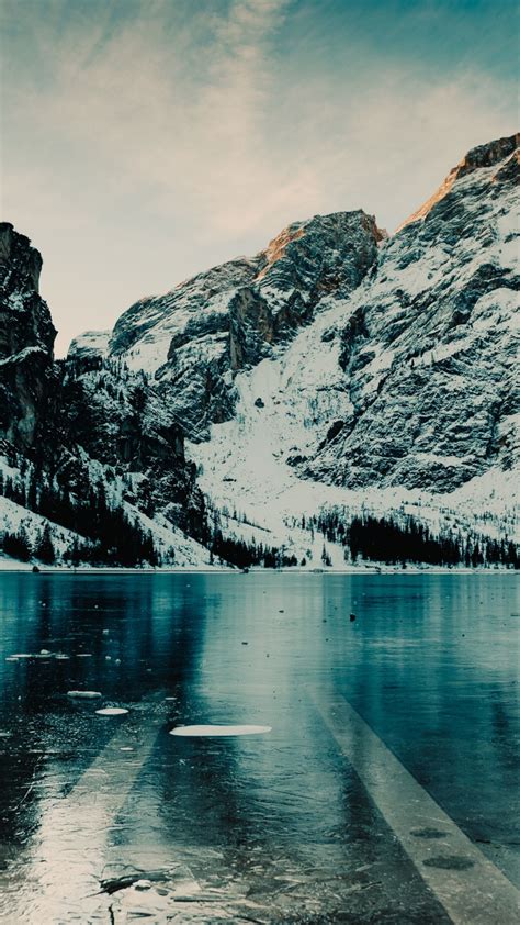 Download Wallpaper 720x1280 Winter Mountains Floating Ice Lake