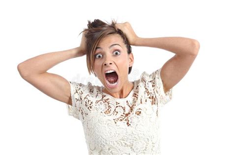 Front View Of A Scared Woman Screaming With Hands On Head Isolated On