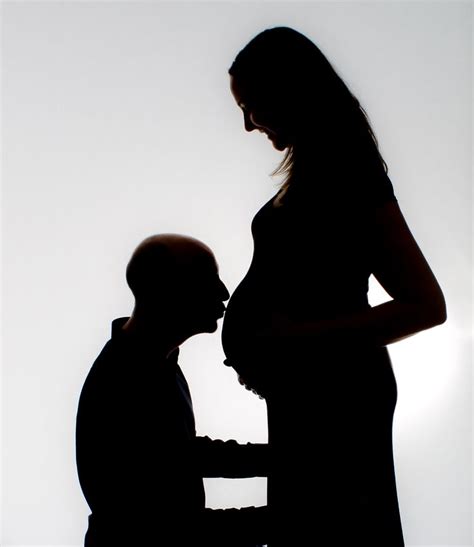 Silhouette Of Dad Kissing Baby Bump Silhouette Maternity Photography