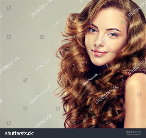 Beautiful Girl With Long Wavy Hair Brunette With Curly Hairstyle