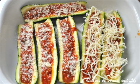 After discarding the two ends, cut the zucchini lengthwise in two halves. Zucchini Stuffed with Bolognese and Cheese - 2 Sisters ...