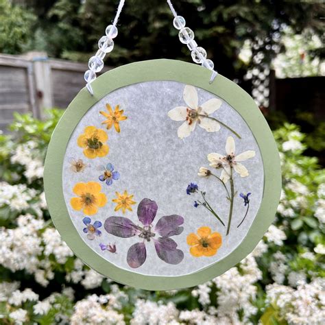 Make A Suncatcher With Pressed Flowers And Leaves Mud And Bloom