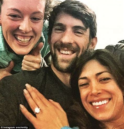 pals swimmer allison schmitt also shared a picture of herself with the happy couple which