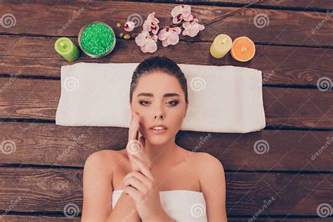 Sensual Woman With Perfect Skin Relaxing In Sauna With Candles Stock