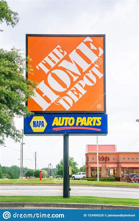 The Home Depot Sign Combined With Napa Auto Parts Store Signs Editorial