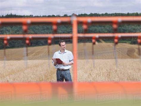 Farmer Checking Crop Stock Photo Dissolve