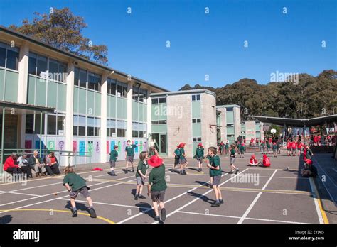 Sydney School Children Playing Games In Their Primary School Playground