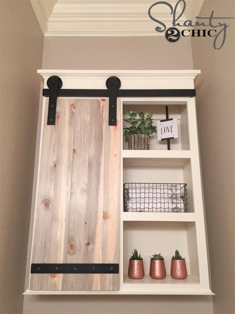 Maybe you would like to learn more about one of these? DIY Sliding Barn Door Bathroom Cabinet - Shanty 2 Chic