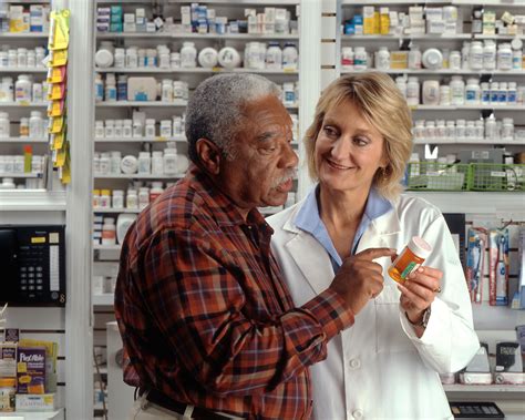 Fileman Consults With Pharmacist 1 Wikimedia Commons