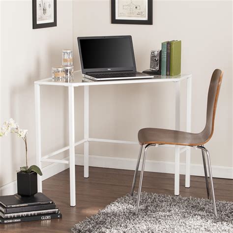 A glass corner desk is rather common in contemporary offices and home work zone arrangements. Keaton Metal/Glass Corner Desk