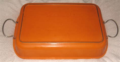 The small imperfections are not harmful and your le creuset can be used with no problems. 1992 Le Creuset 9 Inch Skillet and 5 Quart Roaster (Casserole)
